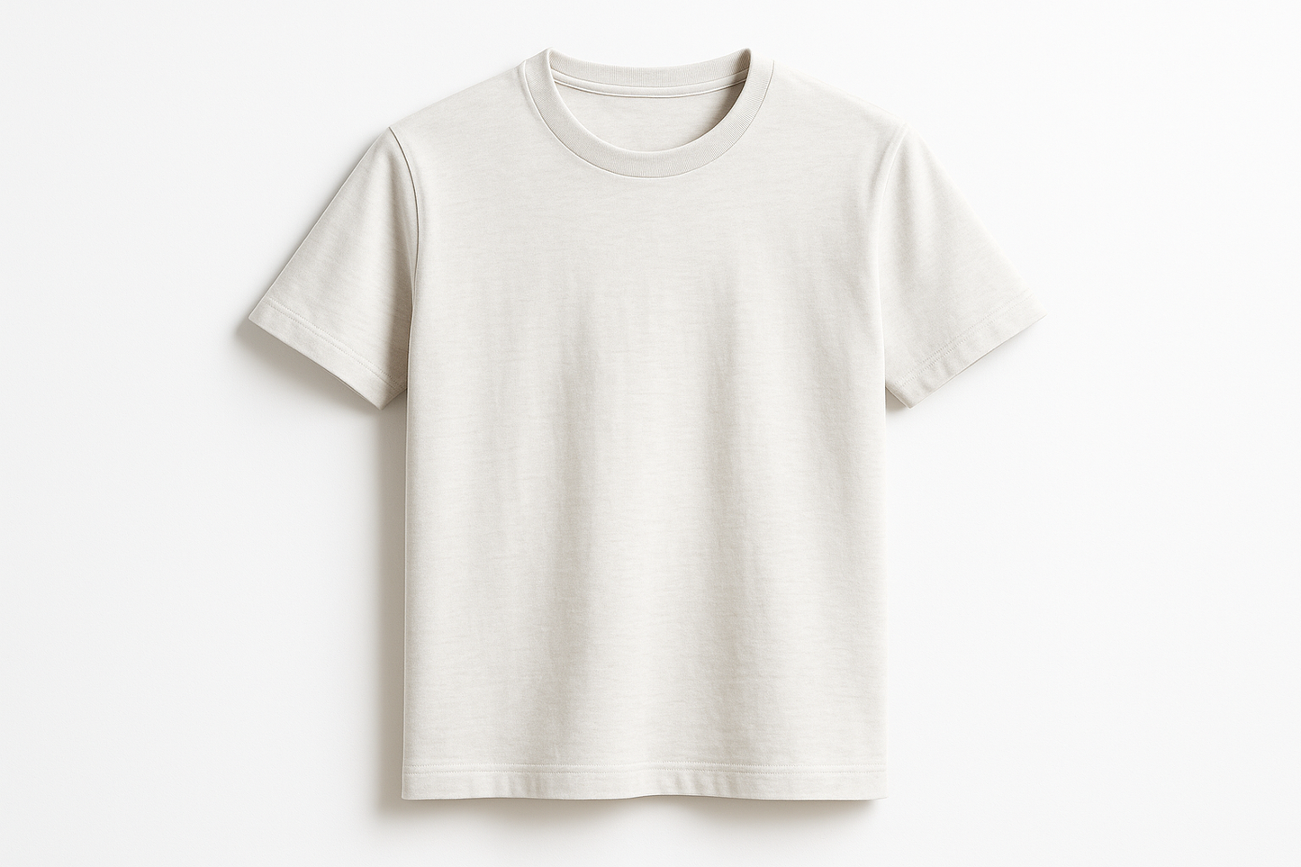 Professional product photography of a premium cotton t-shirt on a clean white background. The t-shirt should be neatly laid flat or on a mannequin, showing the fabric texture and quality. Studio lighting, high resolution, e-commerce style product photo, minimalist and clean presentation