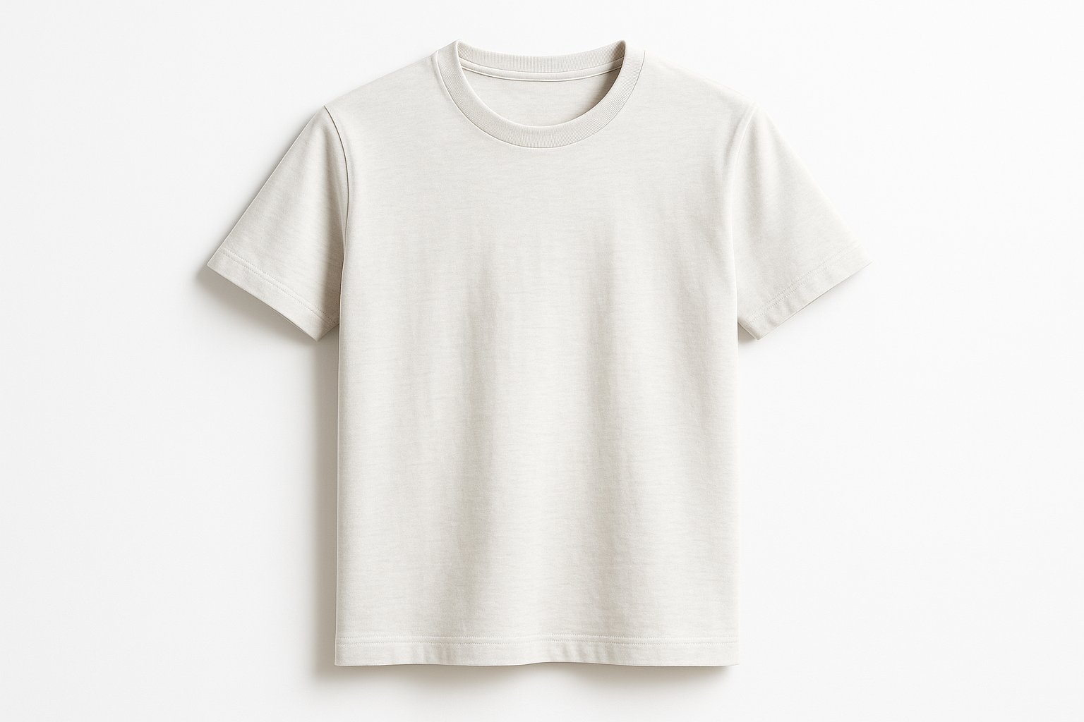 Professional product photography of a premium cotton t-shirt on a clean white background. The t-shirt should be neatly laid flat or on a mannequin, showing the fabric texture and quality. Studio lighting, high resolution, e-commerce style product photo, minimalist and clean presentation
